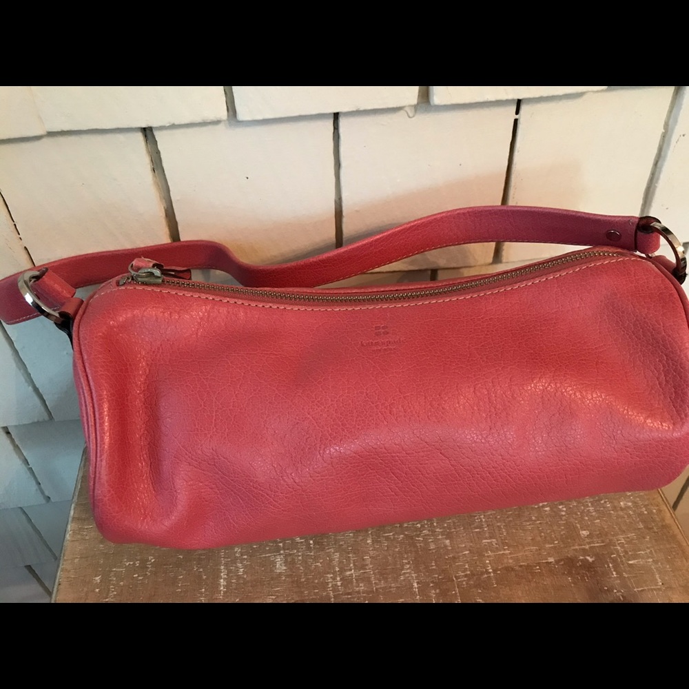 Pink leather cylinder bag